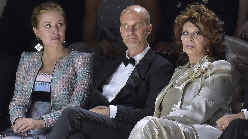 Menyével, Sashával és fiával, Edoardóval a bemutatón (Fotó: Getty Images)